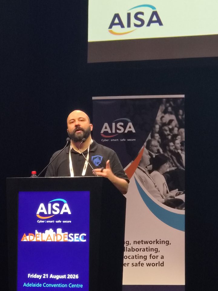 Seth Enoka speaking at the AdelaideSec cybersecurity conference
