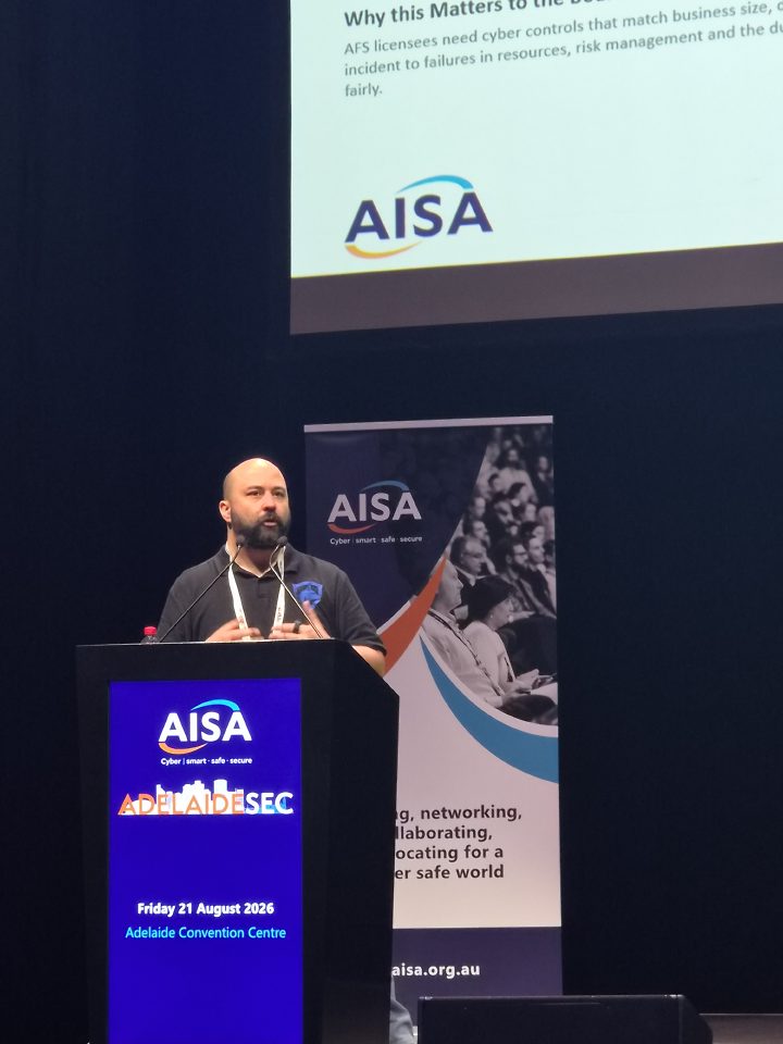 Seth Enoka presenting on cyber risk at AdelaideSec